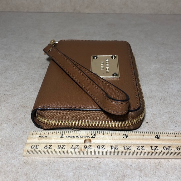 9. Michael Kors Cognac Zip Around Wristlet - Picture 13 of 14